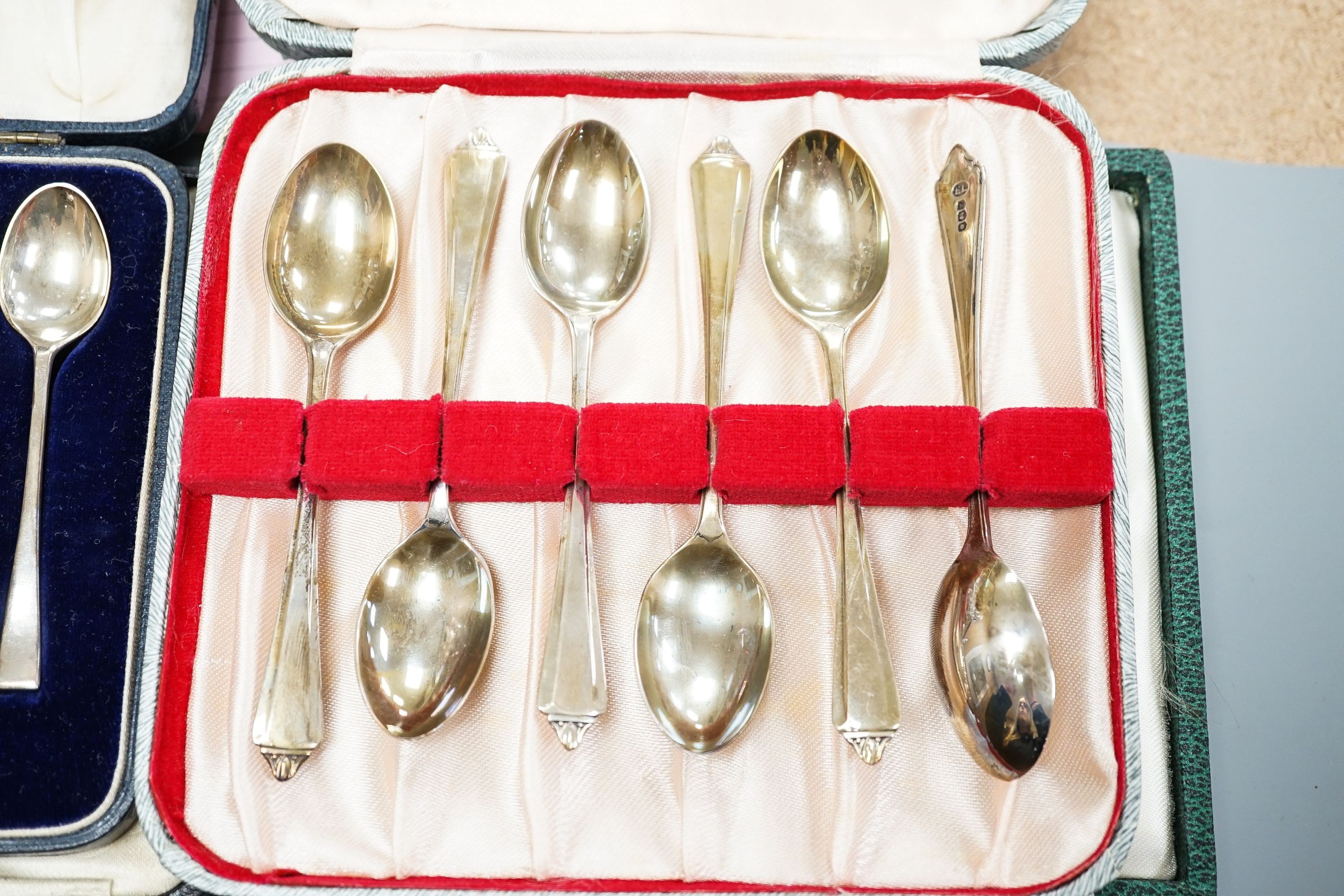 Seven assorted cased sets of English silver tea and coffee spoons, including a set of twelve silver gilt teaspoons, London, 1882 (one set incomplete).